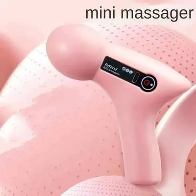 Mini pink electric massager with a digital display against a soft pink background.