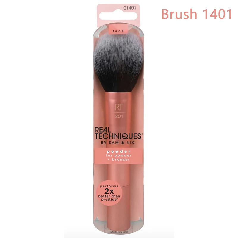 Real Techniques Brush 1401 for powder and bronzer, featuring a soft nylon bristle head and durable plastic handle.