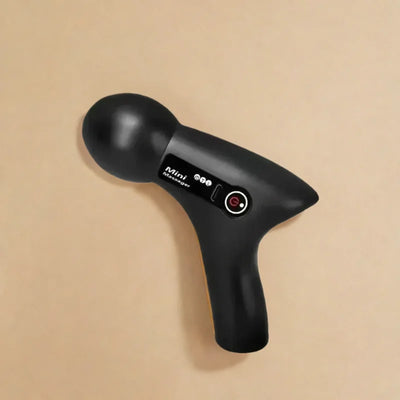 Portable electric muscle massage gun with ergonomic grip for deep tissue massage.